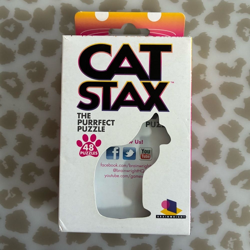 Cat Stax the perfect puzzle game ages 10+, 1 player 
48 challenge cards